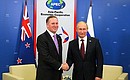 With Prime Minister of New Zealand John Key.