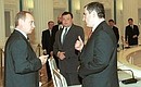 President Vladimir Putin with Mikhail Khodorkovsky, CEO of the Yukos oil company.