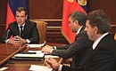 At a meeting on improving legislation. With First Deputy Chief of Staff of the Presidential Executive Office Vyacheslav Volodin (centre) and Justice Minister Alexander Konovalov.