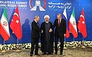 С Президентом Ирана Хасаном Рухани (в центре) и Президентом Турции Реджепом Тайипом Эрдоганом.