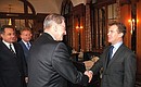 С президентом Международного олимпийского комитета Жаком Рогге.