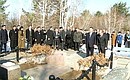 President Putin at the grave of the father of the Japanese Prime Minister Yoshiro Mori.