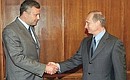 С президентом Национального резервного банка Александром Лебедевым.