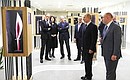During his visit to the Russian International Olympic University, the President toured a private collection of Olympic artifacts that belongs to Interros President Vladimir Potanin.