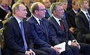 На Первом форуме Всемирной ассоциации олимпийцев. С правящим Князем Монако Альбертом II (в центре) и президентом Всемирной ассоциации олимпийцев Жоэлем Бузу.