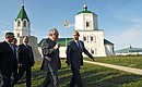 With chairman of the board of trustees of the Republican Foundation for the Revival of Historical and Cultural Monuments of the Republic of Tatarstan Mintimer Shaimiyev during a visit to the Bolgar Historical and Architectural Reserve.