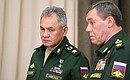 Defence Minister Sergei Shoigu (left) and Chief of the General Staff Valery Gerasimov before the meeting with Defence Ministry and defence industry senior officials and heads of ministries and regions.
