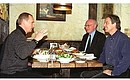 President Vladimir Putin and British Prime Minister Tony Blair at an informal dinner.