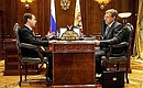С Заместителем Председателя Правительства — Министром финансов Алексеем Кудриным.
