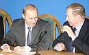 President Putin with the Ukrainian President Leonid Kuchma during the Russian-Ukrainian Economic Forum.