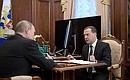 At the meeting with Prime Minister Dmitry Medvedev.