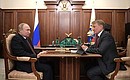 С президентом, председателем правления Сбербанка России Германом Грефом.