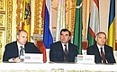 CIS leaders giving a news conference after their summit. President Putin with Presidents Emomali Rakhmonov of Tajikistan and Islam Karimov of Uzbekistan (right).