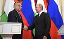 Press conference following the Russian-Hungarian talks. With Prime Minister of Hungary Viktor Orban.