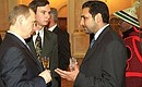 The Russian President with Ahmad Zia Massoud, Ambassador of Afghanistan.