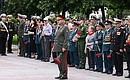 Defence Minister Sergei Shoigu lays flowers at the Eternal Flame.
