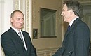 President Putin talking to British Prime Minister Tony Blair.