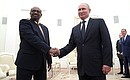With President of the Republic of Sudan Omar Al-Bashir.