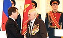 Церемония вручения государственных наград. Орденом Славы III степени награждается Анатолий Калинкин.
