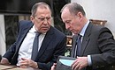 Foreign Minister Sergei Lavrov and Secretary of the Security Council Nikolai Patrushev before a meeting with permanent members of the Security Council.
