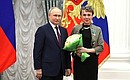 The Order of Friendship is presented to Galina Alekseyeva, research director at the Leo Tolstoy Museum-Estate Yasnaya Polyana, Tula Region. Photo: Mikhail Tereshenko, TASS