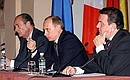 President Putin at a news conference summarising his talks with French President Jacques Chirac and German Federal Chancellor Gerhard Schroeder.