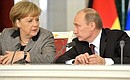 With Federal Chancellor of Germany Angela Merkel at the news conference following Russian-German interstate consultations.