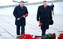 Laying flowers at the grave of Marshal of the Soviet Union Vasily Chuikov. Plenipotentiary Envoy to the Southern Federal District Vladimir Ustinov (right) and Governor of the Volgograd Region Andrei Bocharov.