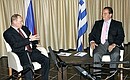 With Greek Prime Minister Kostas Karamanlis.