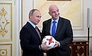 With FIFA President Gianni Infantino. The head of FIFA presented the President of Russia with the Krasava, the official football for the 2017 FIFA Confederations Cup.