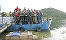 With fishermen during a visit to a fishing settlement on the Paratunka River.