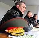 Во время наблюдения за ходом военных учений в районе Чёрного моря с начальником Генерального штаба Вооружённых Сил Валерием Герасимовым и Министром обороны Сергеем Шойгу.
