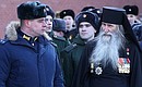 Participants in the wreath-laying ceremony at the Tomb of the Unknown Soldier. Hero of the Russian Federation Lieutenant Colonel Roman Cheremukhin (left) and Hero of the Soviet Union Monk Cyprian.
