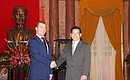 With President of Vietnam Nguyen Minh Triet.