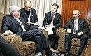 Talking with Australian Prime Minister John Howard.