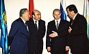 From left to right, President Vladimir Putin with Kazakh President Nursultan Nazarbayev, Kyrgyz President Askar Akayev and Tajik President Emomali Rakhmonov before the Collective Security Council meeting of Collective Security Treaty Organisation member states.