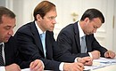 The meeting on the prospects for gas engine fuel. From left to right: Emergencies Minister Vladimir Puchkov, Industry and Trade Minister Denis Manturov and Deputy Prime Minister Arkady Dvorkovich.