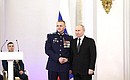 Presentation of Gold Star medals to Heroes of Russia. With Senior Sergeant Alexander Mikhailov. Photo: Valery Sharifulin, TASS