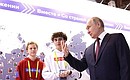 Vladimir Putin learned about key youth policy projects presented by the Youth Centre at the Manezh Central Exhibition Hall. Photo: Valery Sharifulin, TASS
