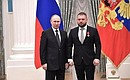 Presentation of state decorations. Yevgeny Poddubny, special correspondent at VGRTK National Radio and Television Broadcasting Company, is awarded the Order for Services to the Fatherland, IV degree.