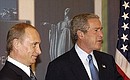 With US President George Bush.