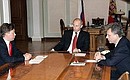 Meeting with Gazprom\'s chairman of the board Aleksei Miller and Industry and Energy Minister Viktor Khristenko.