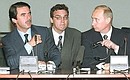 President Putin and Prime Minister Jose Maria Aznar attending a meeting of Russian and Spanish businessmen.