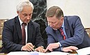 Before the beginning of the meeting on developing the United Aircraft Corporation. Presidential Aide Andrei Belousov (left) and Chief of Staff of the Presidential Executive Office Sergei Ivanov.
