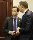 At the State Council Presidium meeting on environmental safety. Presidential Aide Arkady Dvorkovich and CEO of Basic Element Oleg Deripaska.