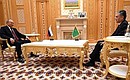 В ходе встречи с председателем верхней палаты парламента Туркменистана Гурбангулы Бердымухамедовым. Фото: Дмитрий Азаров, «Коммерсантъ»