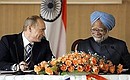With Indian Prime Minister Manmohan Singh during the ceremony for signing Russian-Indian documents.