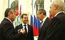 С Президентом Республики Южная Осетия Эдуардом Кокойты, Министром иностранных дел Сергеем Лавровым и Президентом Республики Абхазия Сергеем Багапшем (слева направо).