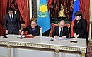Signing joint documents. With President of Kazakhstan Nursultan Nazarbayev.