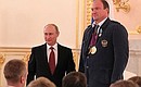 Presenting state decorations to London Paralympic Games champions and medallists. Order of Friendship presented to Alexey Ashapatov, who won two gold medals.